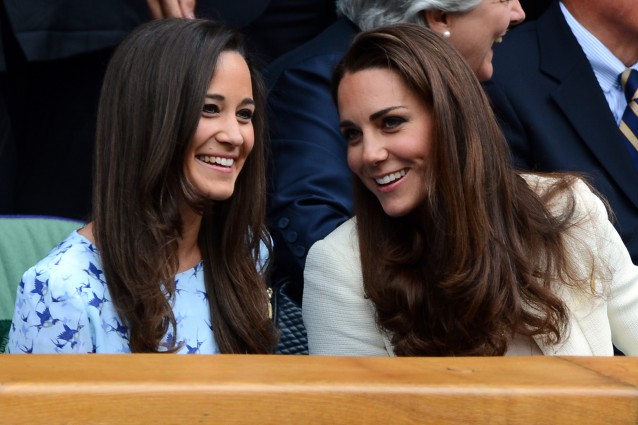 Catherine, Duchess of Cambridge (R) and