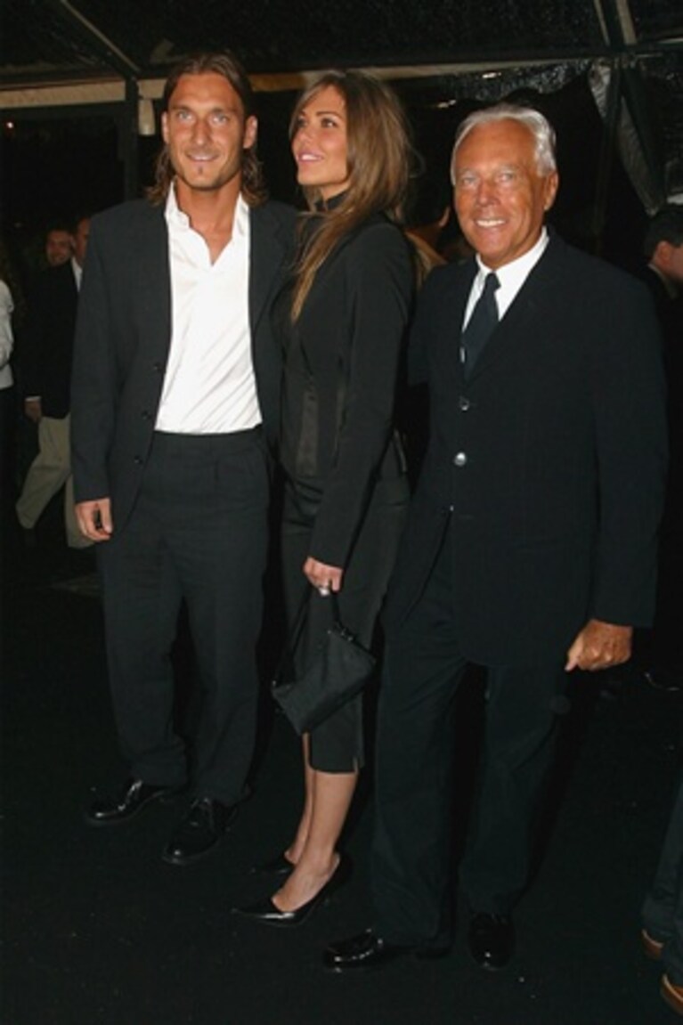 Totti e Ilary con Armani