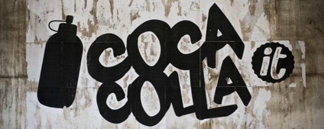 Il sito italiano che si occupa di arte, design, advertising e nuove culture è costretto a rinunciare al suo nome, troppo simile a quello della multinazionale Coca Cola: i ragazzi del blog rinunciano alla battaglia legale ma non a quella sul web. E l’hashtag #supportcocacolla vola su Twitter.