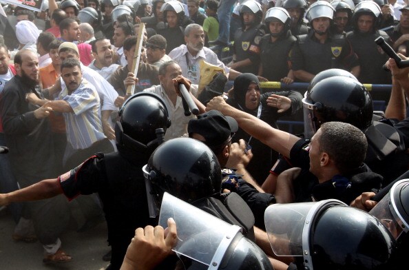 Egyptian riot policemen stop anti-(Hosni