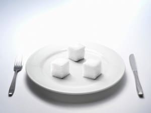 Sugar placed on white dish