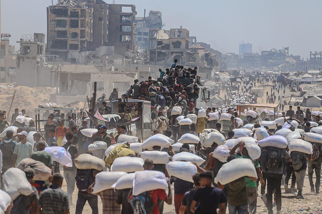 Guerra a Gaza, nuovi raid israeliani: 13 morti, tra cui 2 bambini. Netanyahu: "Non c'è fame nella Striscia"
