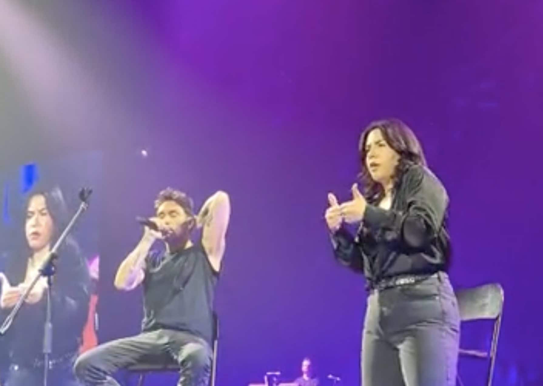 Giorgina, non udente, interpreta in lingua dei segni sul palco di Fabrizio Moro: il sogno realizzato a Roma