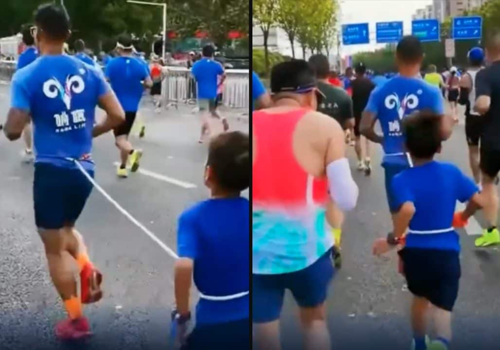 Cina, bimbo di 9 anni legato con una corda al padre corre la mezza maratona: uomo squalificato per tre anni