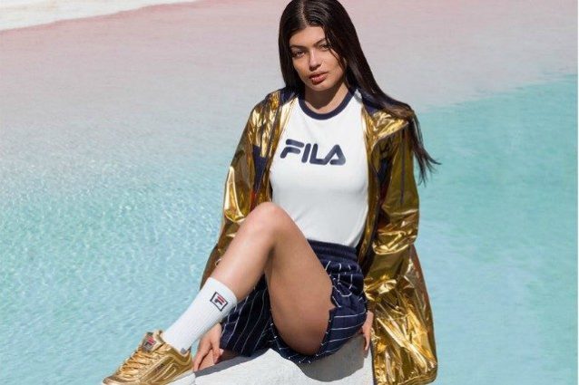 tuta fila lucida nera e oro