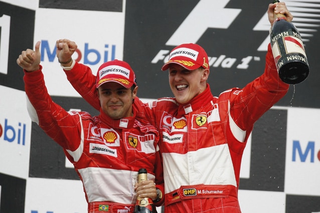 Felipe Massa e Micheal Schumacher festeggiano sul podio – Getty Images