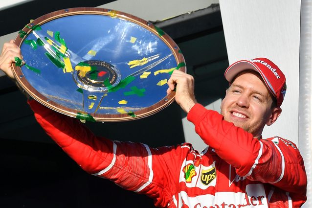 Sebastian Vettel esulta sul podio di Melbourne - Getty Images