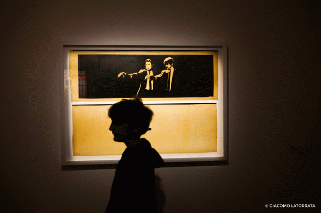 Pulp Fiction by Banksy, Palazzo Cipolla. Credits: Giacomo Latorrata