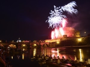 A general view shows fireworks over the Tiber river and the Castel Sant’Angelo (St Angel castle) during the traditional ’Girandola’ the feast of Romes patron St Peter and Paul, on June 29, 2014 in Rome. AFP PHOTO / TIZIANA FABI (Photo credit should read TIZIANA FABI/AFP/Getty Images)