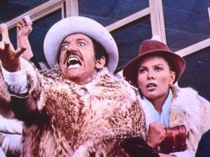 Gigi Proietti e Nikki Gentile in una scena del film "Febbre da cavallo" (1976).