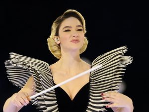 Matilda De Angelis scambiata per Mariah Carey alla cerimonia delle Olimpiadi: la reazione alla gaffe di Petrecca