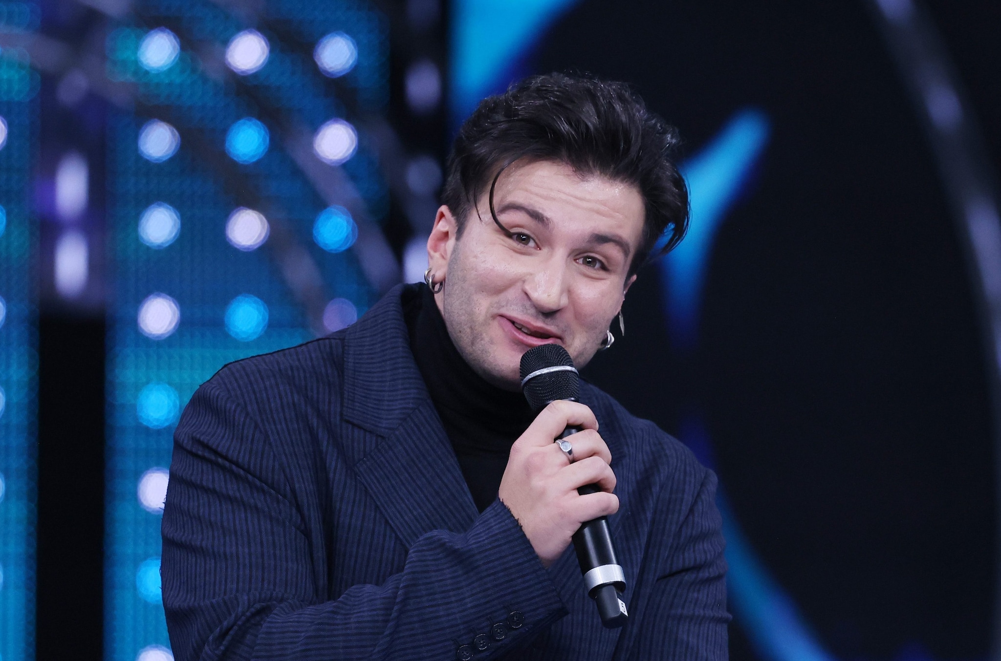 Come ha reagito Eddie Brock all'ultimo posto in classifica a Sanremo: "Era il mio sogno", e mostra il tatuaggio