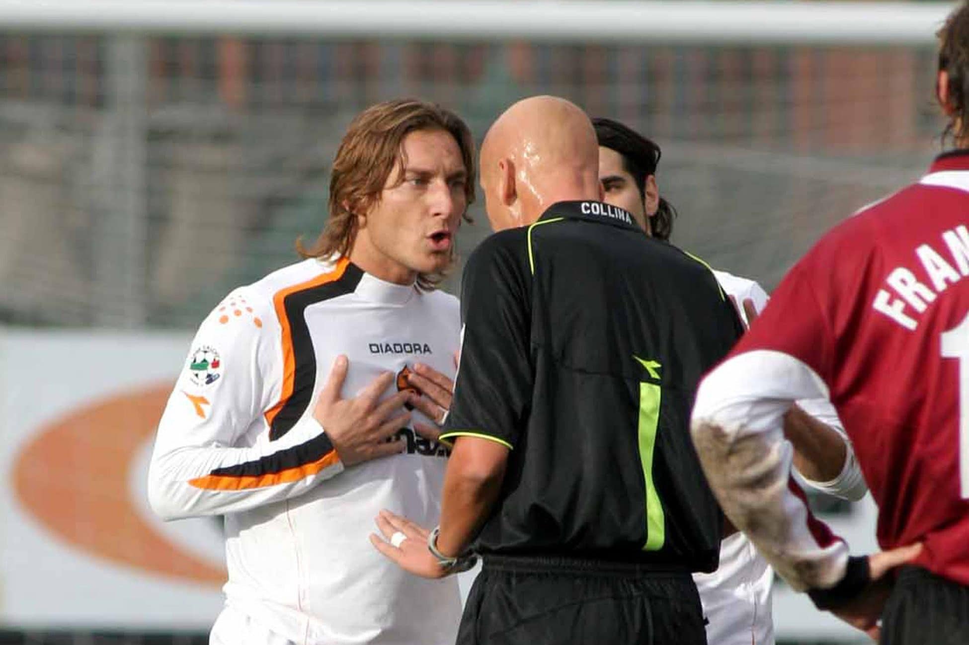 Collina con Francesco Totti in un Reggina–Roma del 2004