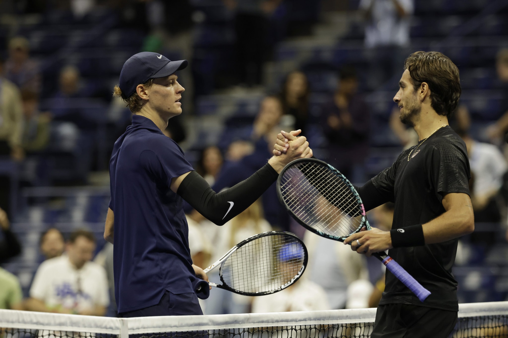 Jannik Sinner e Lorenzo Musetti dopo la partita dei quarti degli US Open 2025.