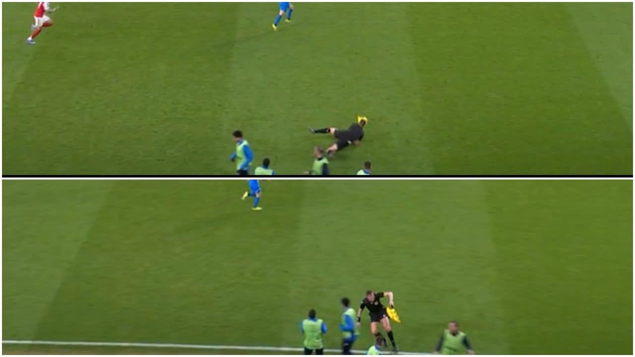 Il guardalinee di Arsenal-Bayer crolla in campo travolto dai giocatori: non si accorge di loro