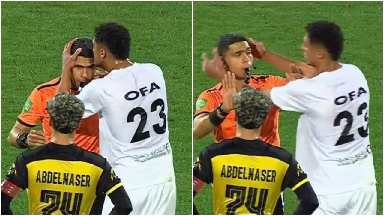 L'arbitro reagisce con rudezza al bacio di un calciatore in campo: Mohamed Kabil lo scaccia via