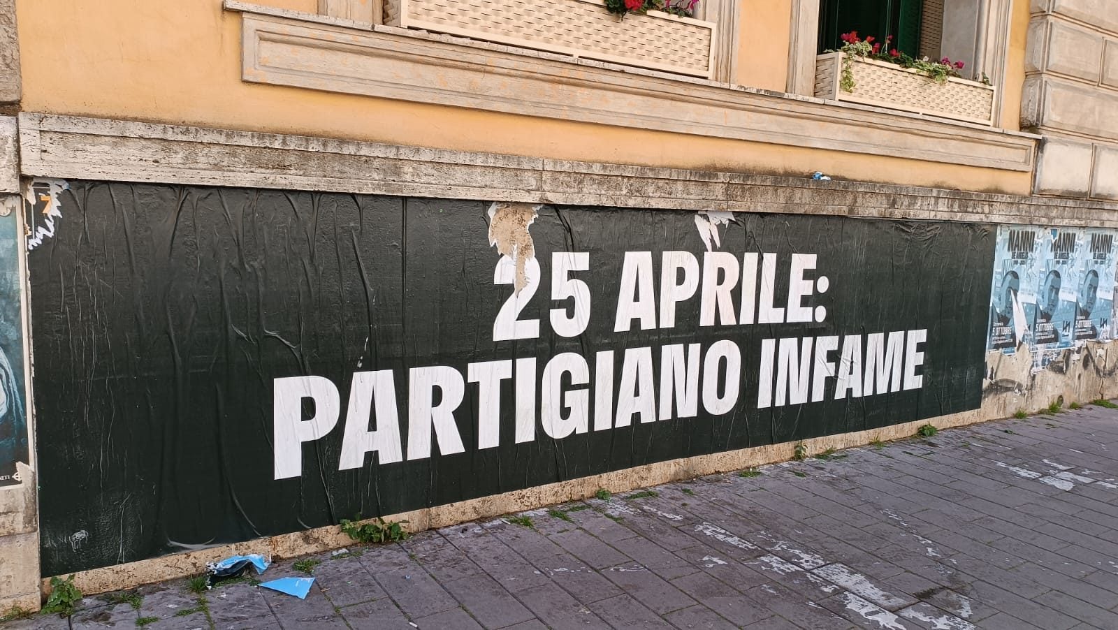 Manifesto affisso a piazza Tarquinia