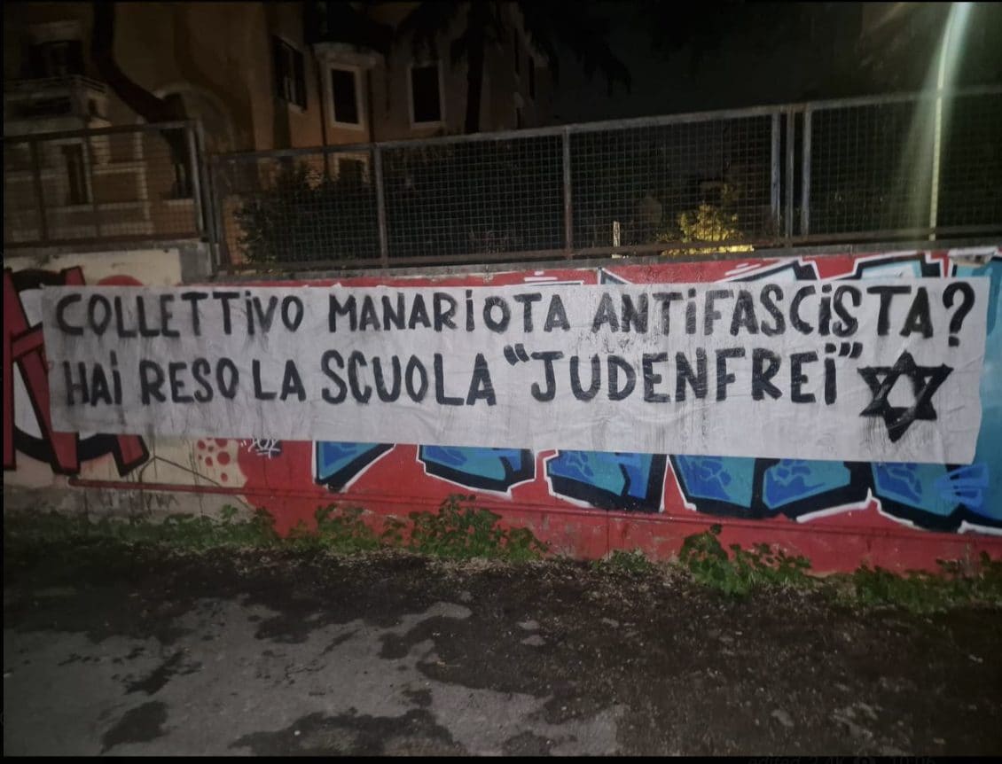 Lo striscione esposto dalla Brigata Vitali davanti al liceo Manara di Roma