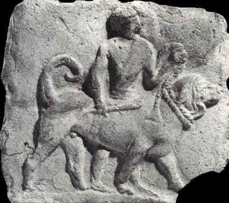 Un bassorilievo assiro del IX secolo avanti Cristo con la raffigurazione di un molosso.
