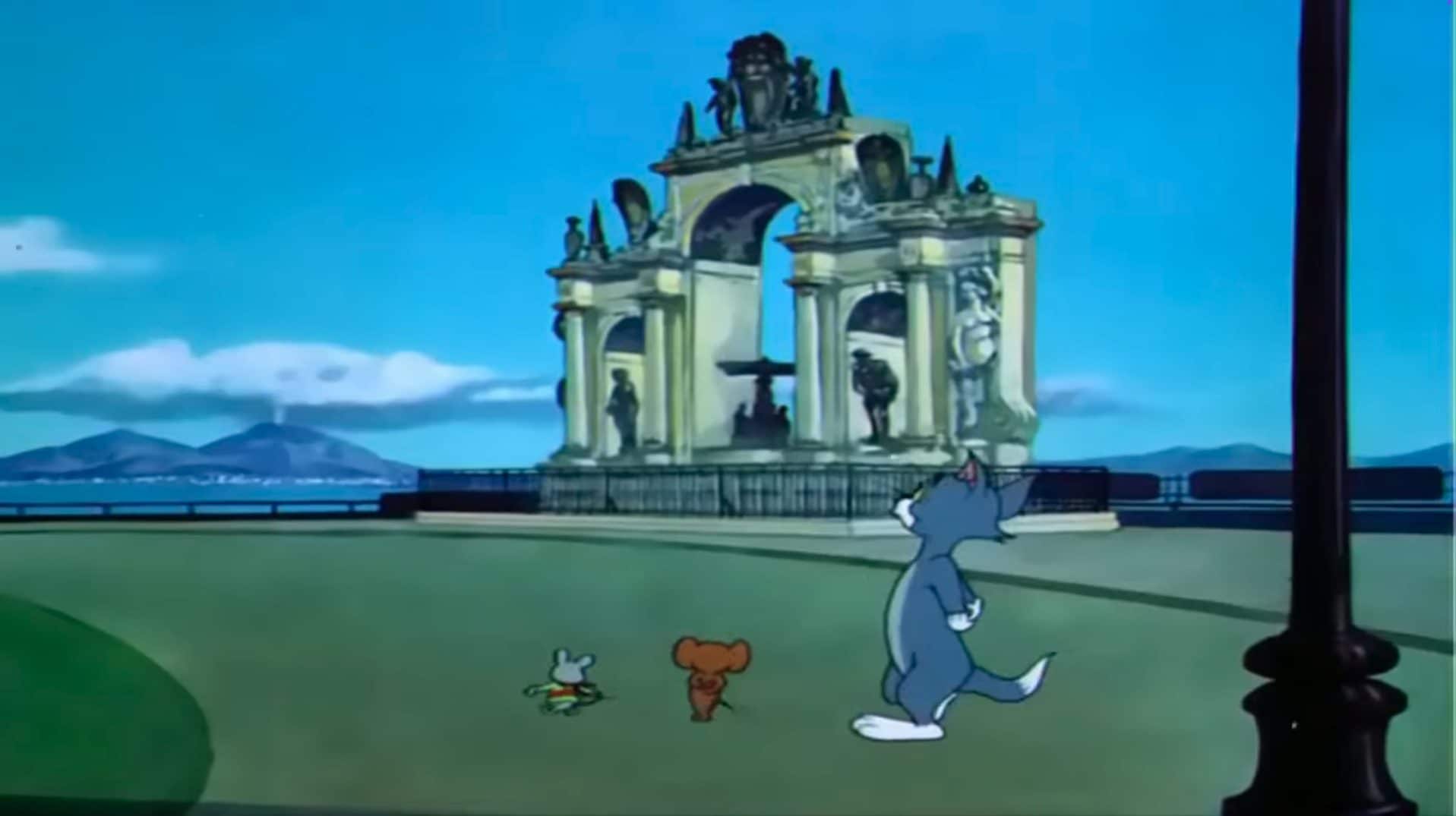 Tom, Jerry e Topo davanti la Fontana sul lungomare di Napoli e il Vesuvio sullo sfondo