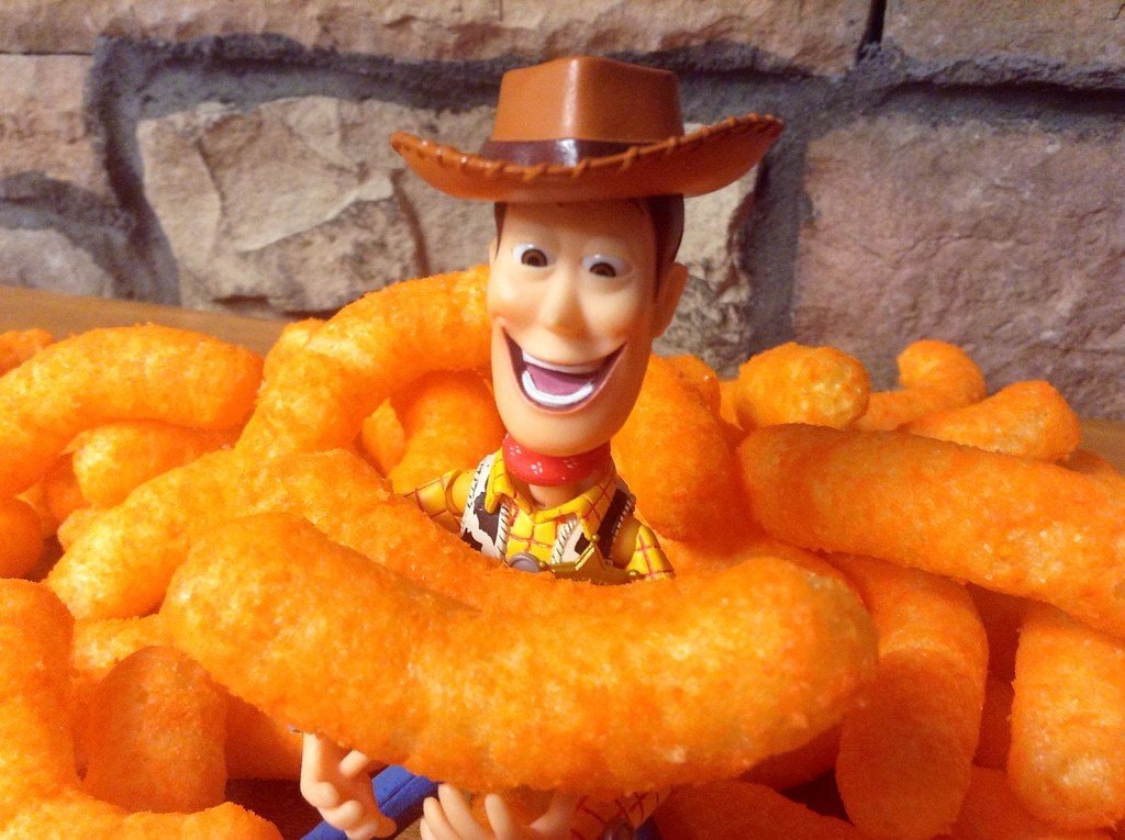 A scene from Toy Story with the Cheetos