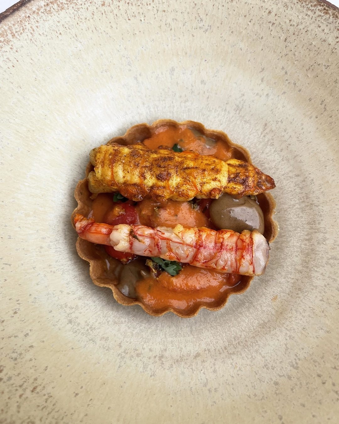 Tartelletta di crostacei e pomodorini