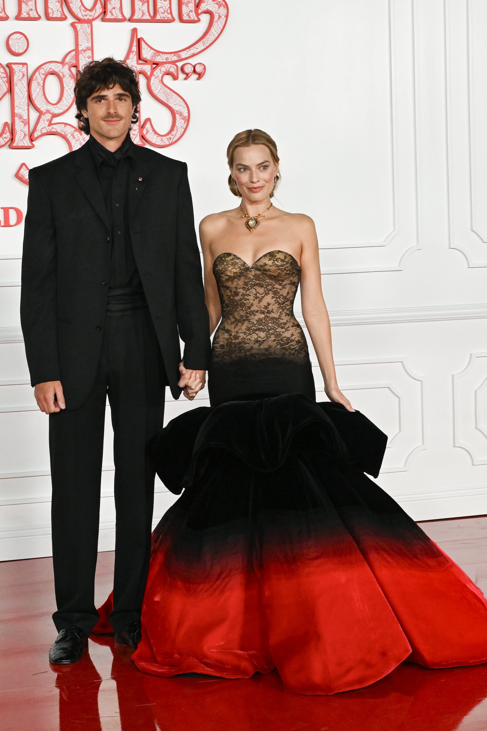 Jacob Elordi in Bottega Veneta, Margot Robbie in Schiaparelli Haute Couture