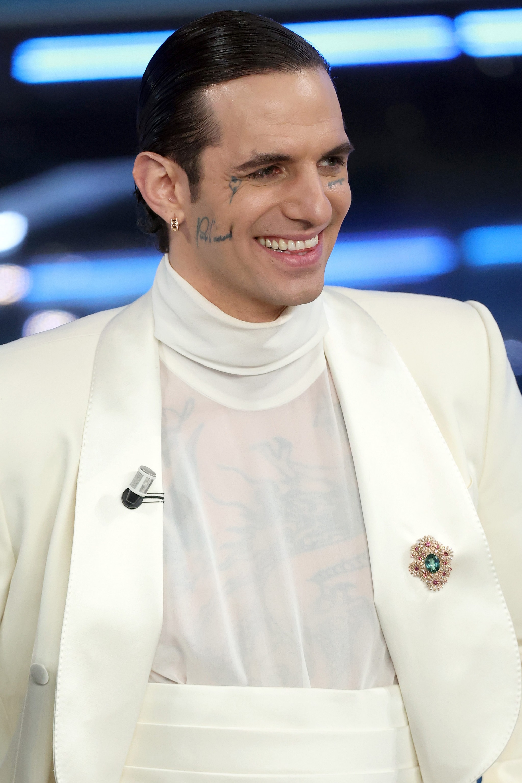 Achille Lauro con spilla Damiani