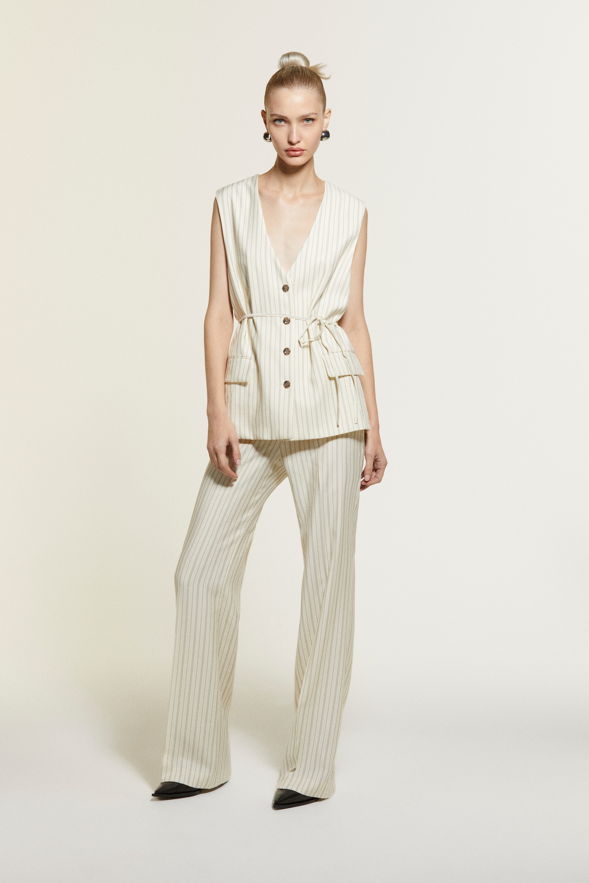 Gilet con fantasia gessata Sisley