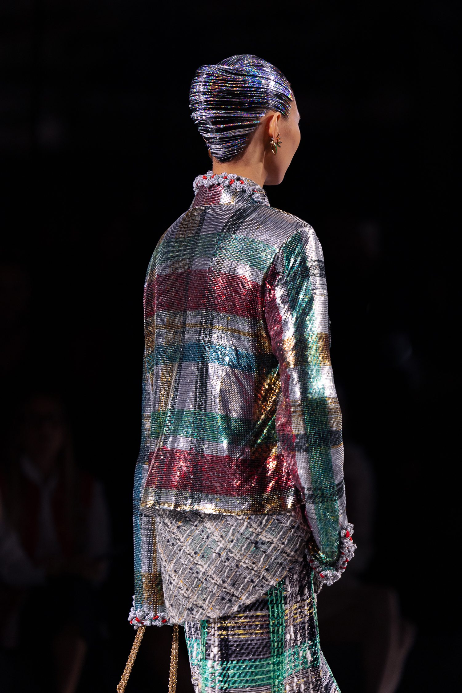 Il bouclé rivisitato sulla passerella Autunno/Inverno 26–27 di Chanel