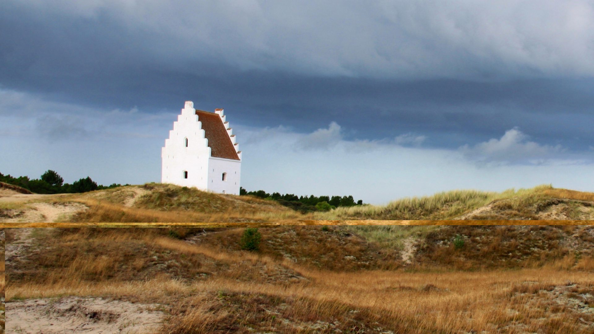 Den Tilsandede Kirke