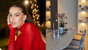 La casa di Sophie Codegoni: cucina con isola e lampade, zona dei ricordi in soggiorno