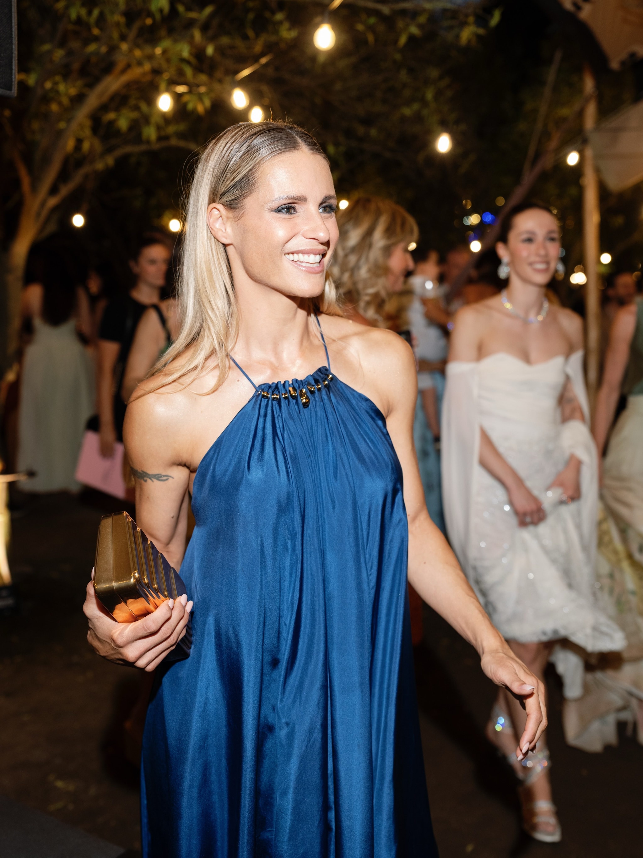 Michelle Hunziker con abito e clutch Zimmermann per la cena pre–wedding