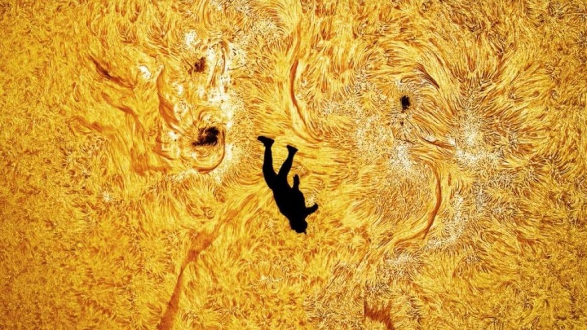Una porzione de "La Caduta di Icaro", l’incredibile astrofotografia del paracadutista Gabriel C. Brown innanzi al Sole. Credit: Andrew McCarthy