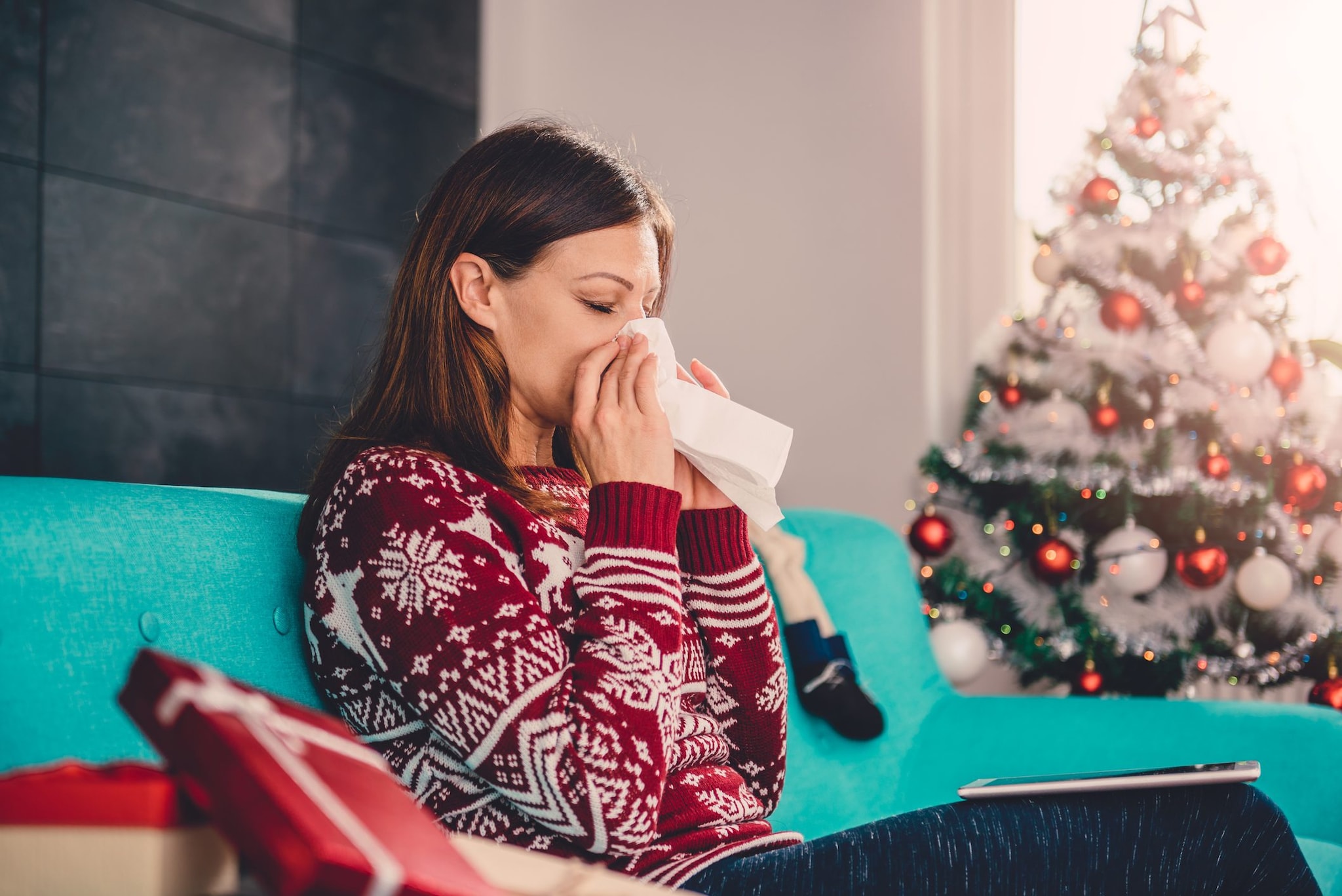 Perché a Natale sarà più facile prendere l'influenza: le risposte di Pregliasco