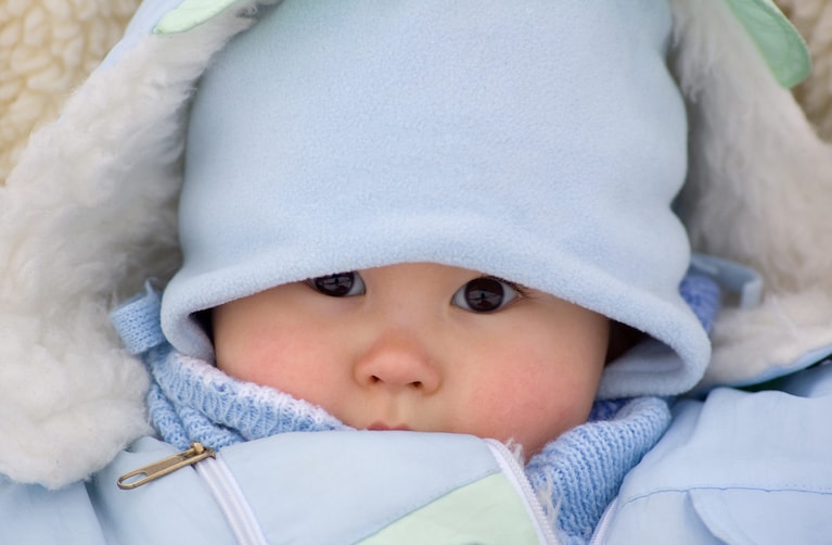 Bambino troppo coperto