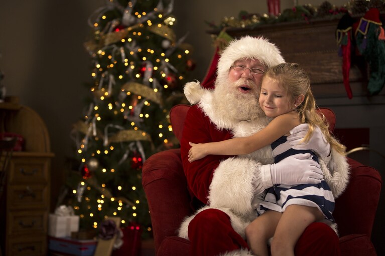 bimbo in braccio a babbo natale